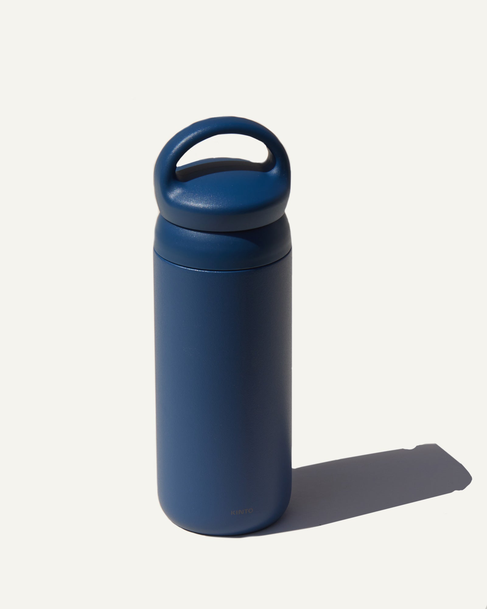 A Kinto blue tumbler made in Japan for Canyon Coffee