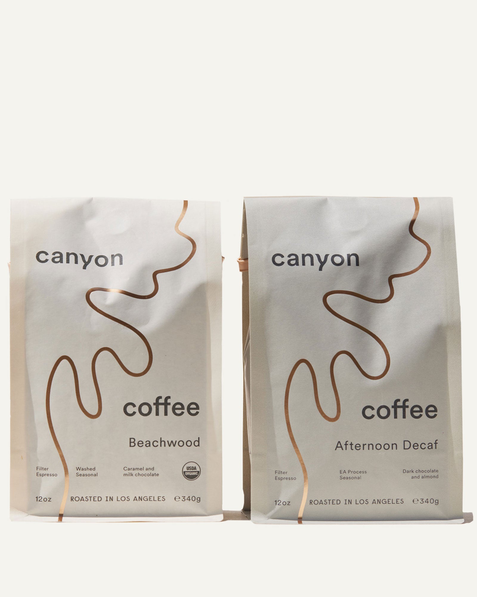 Two bags of Canyon Coffee with gold foil