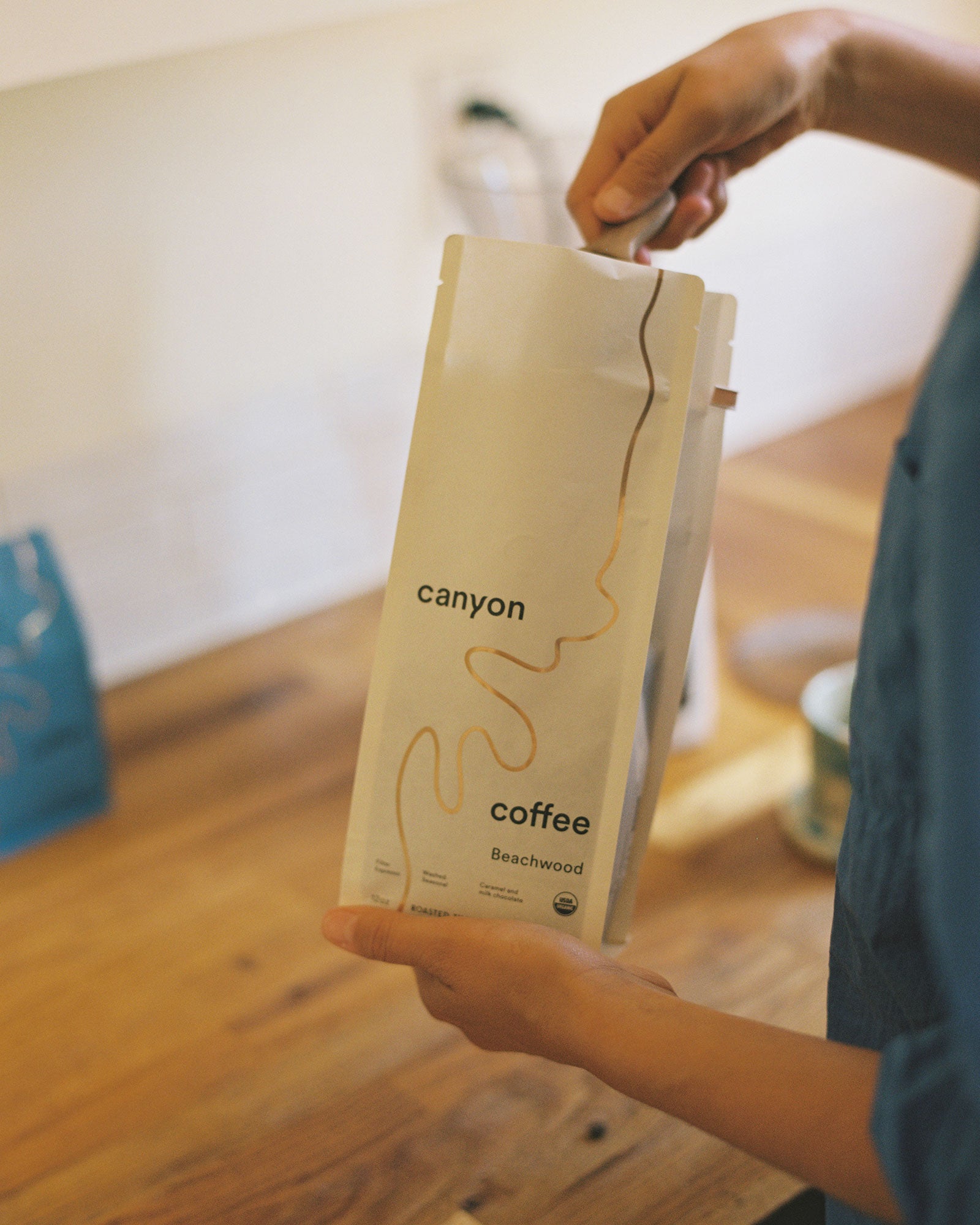 A white bag of Beachwood USDA organic coffee by Canyon Coffee 