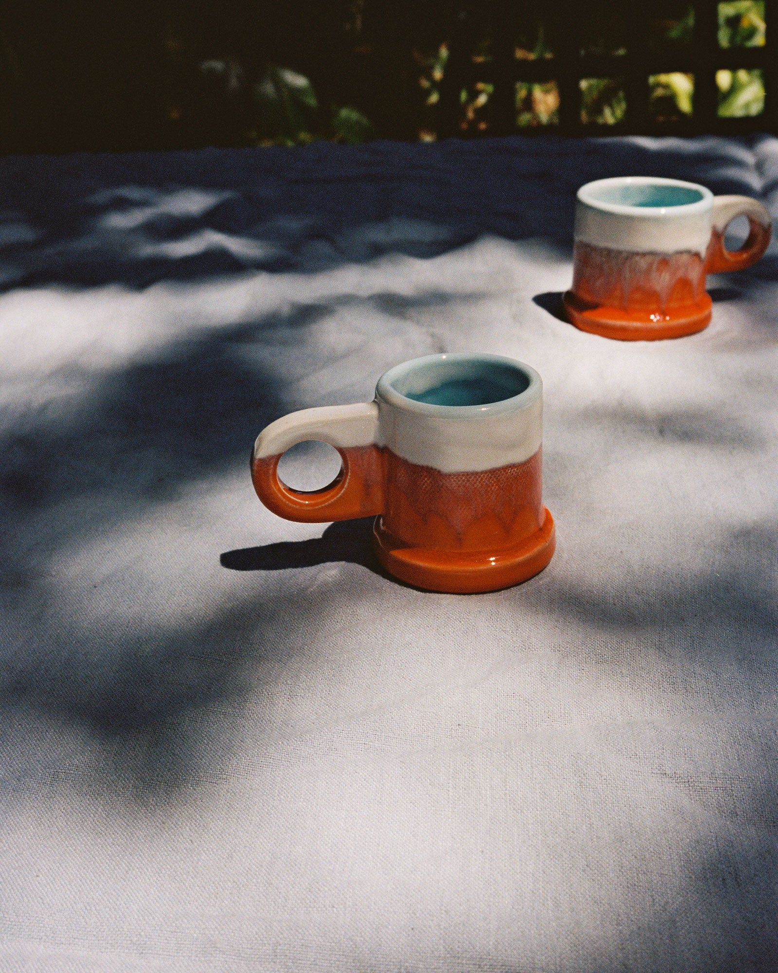 Double Dip Espresso Cup in Sunset by Peter Shire