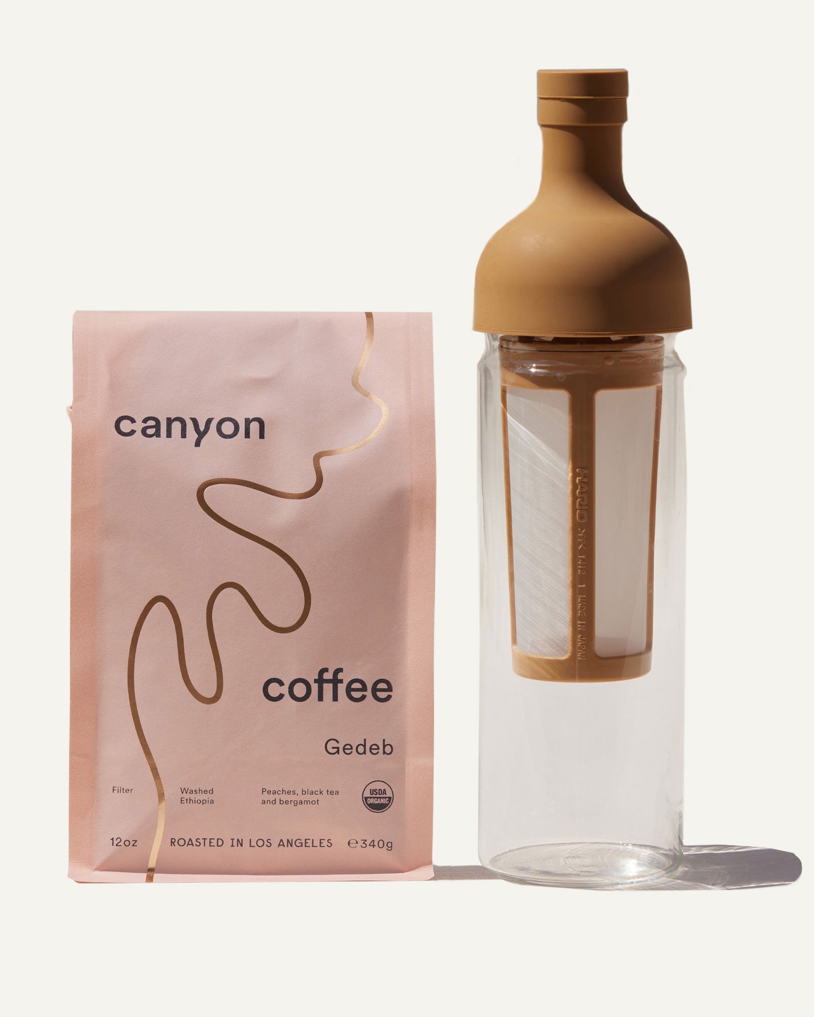 The Cold Brew Kit by Canyon Coffee featuring a bag of Ethiopian organic coffee and a Hario cold brew bottle