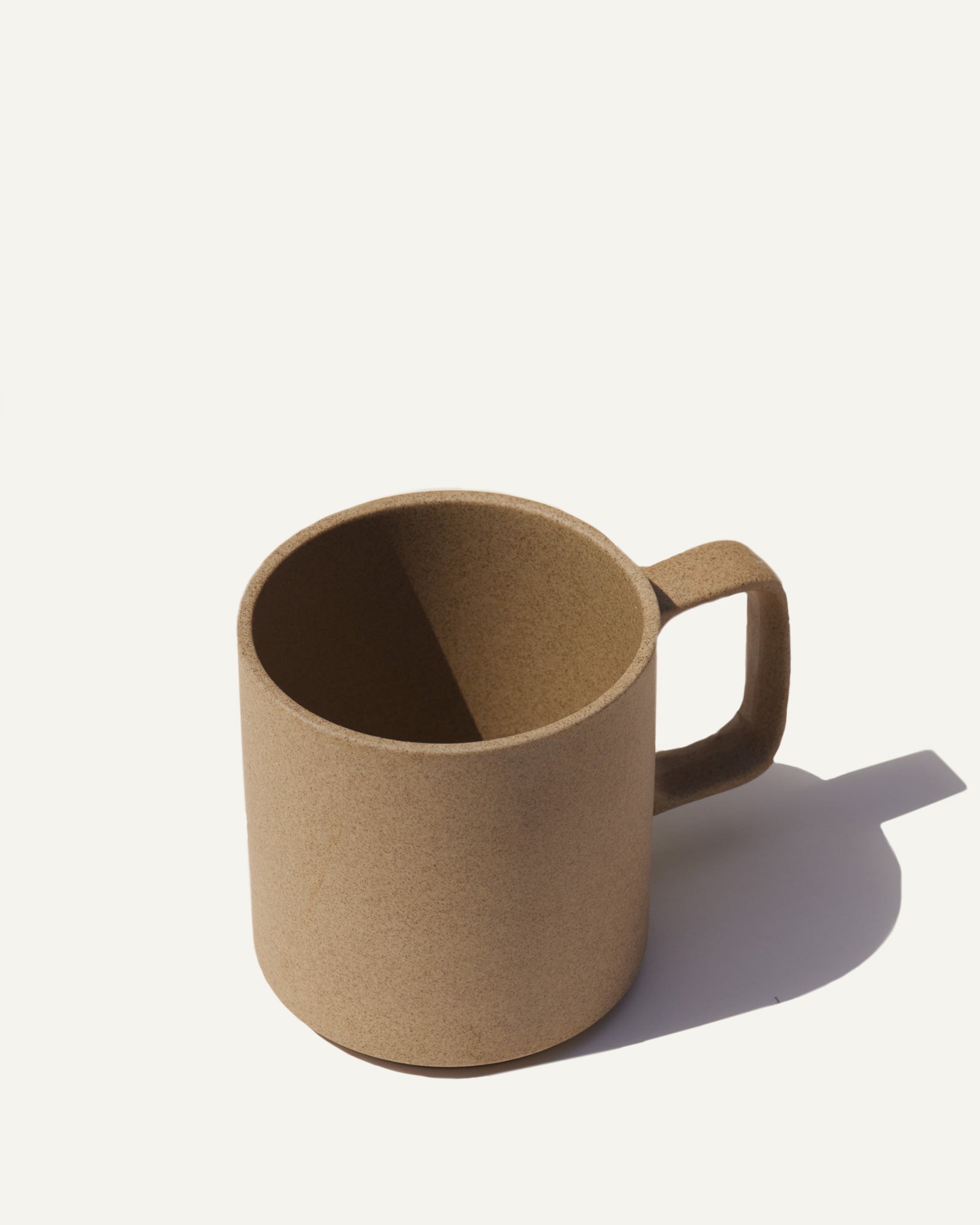 A natural colored ceramic mug from Hasami for Canyon Coffee